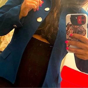 This color is like a odd blue blazer with gold buttons